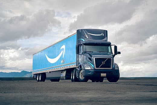 Auto transport truck carrying cars